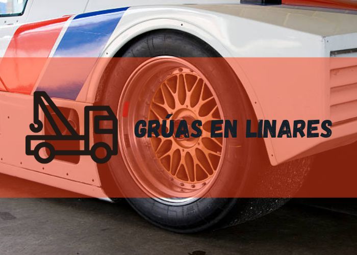 grúa arrastrando un auto en Linares